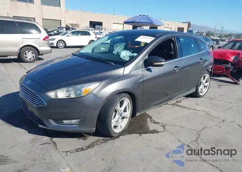 2015 Ford Focus Titanium z USA, uszkodzony, nr VIN 1FADP3N24FL386265